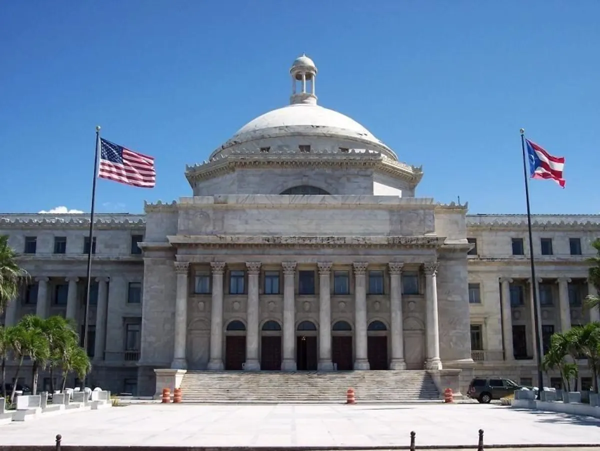 The Capitol of Puerto Rico in San Juan with U.S. and Puerto Rico flags